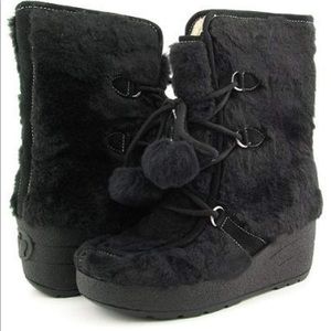 Faux fur fleece lined boots by Juicy Couture